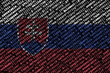 Slovakia flag  is depicted on the screen with the program code. The concept of modern technology...