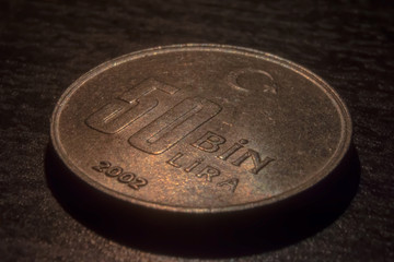 Turkish Bin liras in the dark table