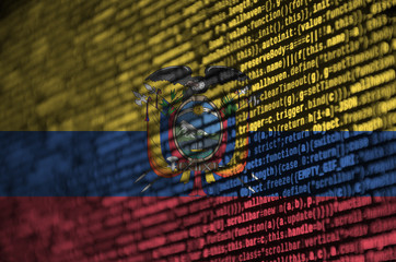 Ecuador flag  is depicted on the screen with the program code. The concept of modern technology and...