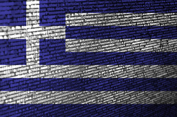 Greece flag  is depicted on the screen with the program code. The concept of modern technology and...