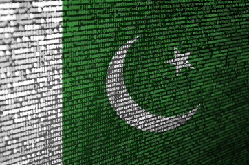Pakistan flag  is depicted on the screen with the program code. The concept of modern technology...