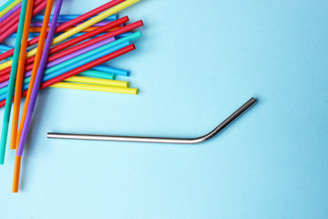 straw straws metal reusable and plastic disposable drinking background colourful  plastic free stock, photo, photograph, image, picture - Powered by Adobe