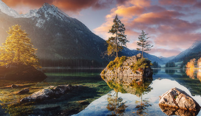 Awesome Alpine Highlands in Sunny Day. impressively beautiful Hintersee lake in beautiful evening...