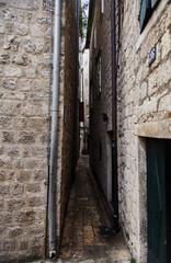 Fototapeta na wymiar Montenegro. The Town Of Kotor. Streets of old Kotor. The narrowest street in Europe 