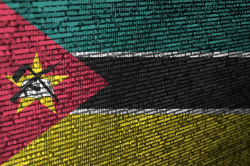 Mozambique flag  is depicted on the screen with the program code. The concept of modern technology...