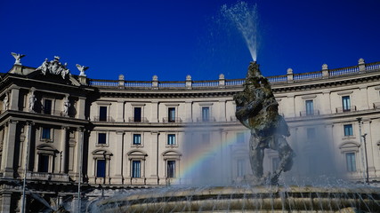 Rome, Italy - September 11, 2018: rainbow on  fountain of the Naiads by the Palermo artist Mario...