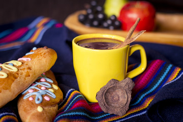 traditional dish and drink Ecuador, called: Colada Morada and bread guaguas