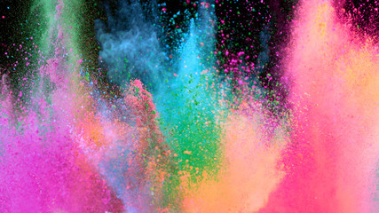 Multi-color powder explosion on black background