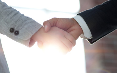 Business people shaking hands isolated on white background