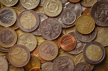 Background of Euro coins money.United kingdom Pound coin.US coins.Group of coins