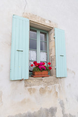 Fototapeta na wymiar French window with blue blinds