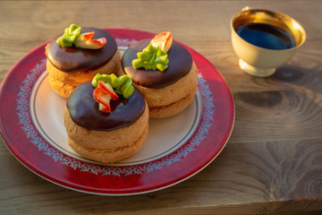 cake with coffee cup on wooden background