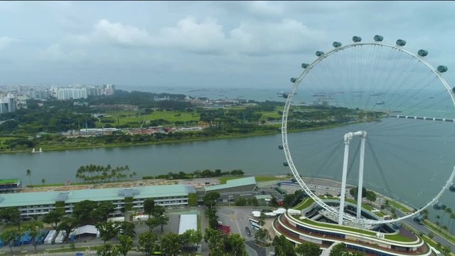 Ferris wheel in Singapore, aerial view. Shot. Singapore Aerial view of the Clarke quay Day Singapore river