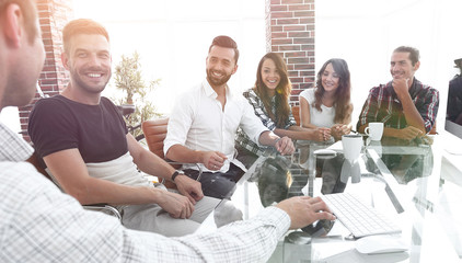 business team sitting at a modern Desk.