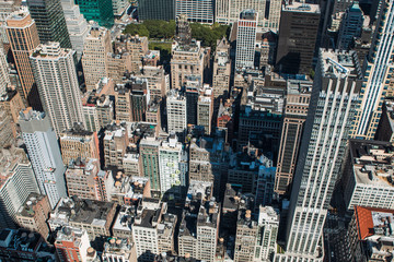 Aerial view of New York City - USA. Manhattan downtown skyline and skyscrapers from the Empire State Building in the morning.