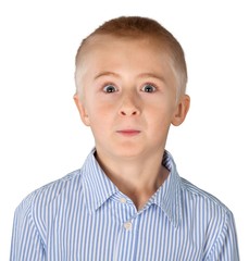 Young boy making spooky eyes