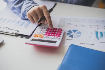 Business man calculate about cost and doing finance at office, Finance managers task, Concept...