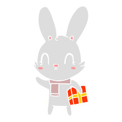 Fototapeta na wymiar cute flat color style cartoon rabbit with christmas present