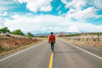 Obraz premium Man walking on road in Utah