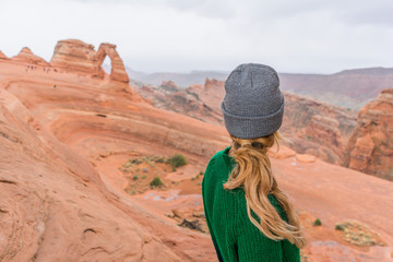 Girl overlooking red mountains Utah