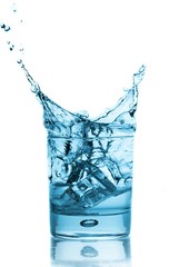 Ice Cube Falling into Glass of Water
