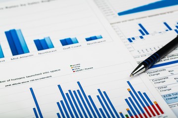 Pen on Business Graphs