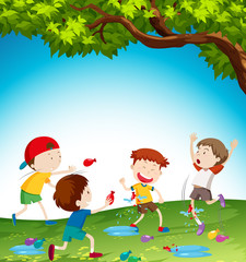 Obraz na płótnie Canvas Kids playing with water balloon