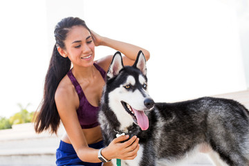 Mexican woman trainning with her dog