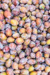 Fresh prunes background