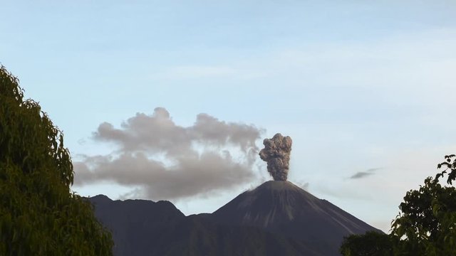 Reventador Volcano erupting in the early morning, November 2015. The mountain is situated in a remote part of the Ecuadorian Amazon surrounded by rainforest.