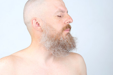 Obraz premium portrait of a bearded man on a light background
