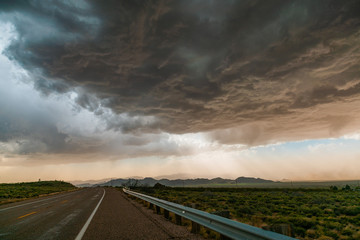 Roadway and stormy clouds