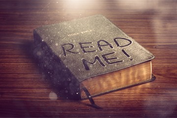 Holy Bible book with read me letters