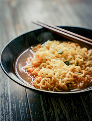 A bowl of rosy Korean noodles