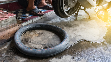 Tire black on the floor.
