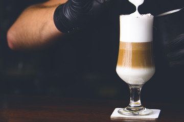Barman making ice coffe.
