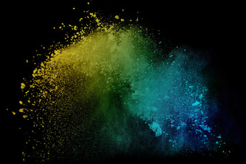Colorful powder or dust explosion isolated on black background  freeze stop motion art abstract...