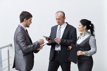 boss reads a working document in the office weekdays