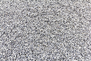 background made of a closeup of a pile of pebbles