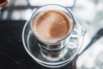 food background top view cup of coffee on table in restaurant