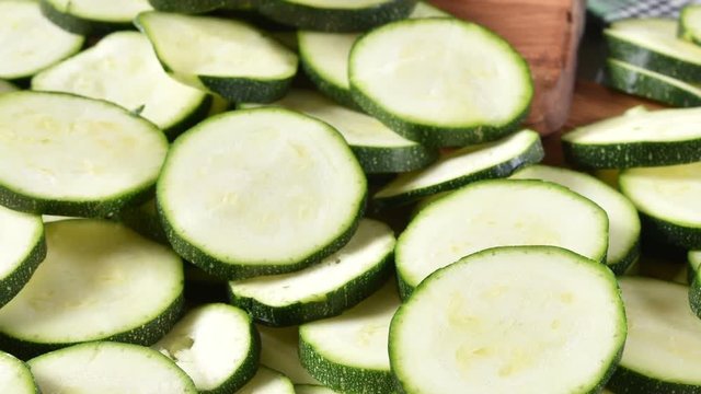 High angle view of sliced zucchini on a cutting board
