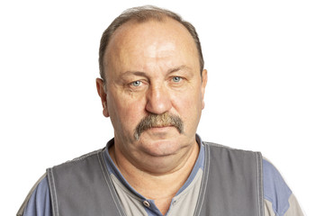 Elderly serious man with a mustache, close-up