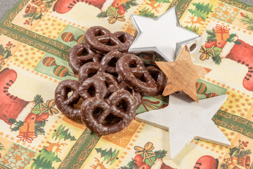 christmas cookies and decorations on wooden table