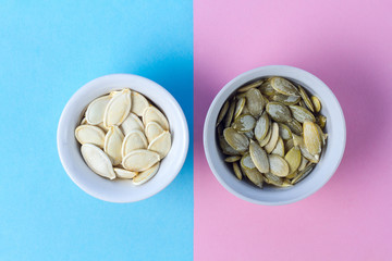 Pumpkin seeds in small saucers.