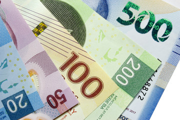 Arrangement of assorted mexican peso bills. - obrazy, fototapety, plakaty