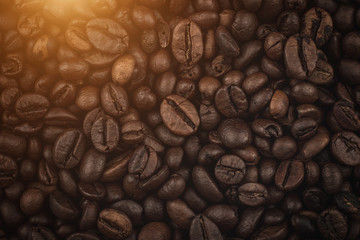 Roasted coffee beans. Background, close-up view.