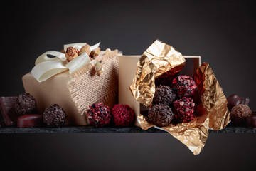Various chocolates in a small gift box.