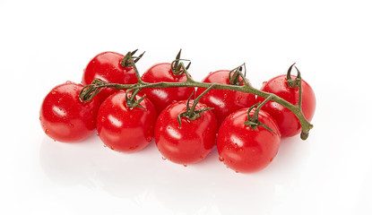 Fresh wet tomatoes isolated on white background