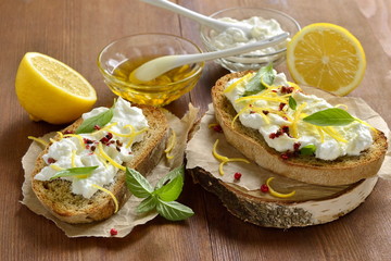 Lemon, basil, pink pepper, ricotta and honey bruschetta