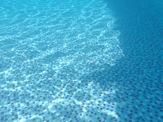 Underwater view of bed of swimming pool for use as background or textures. 